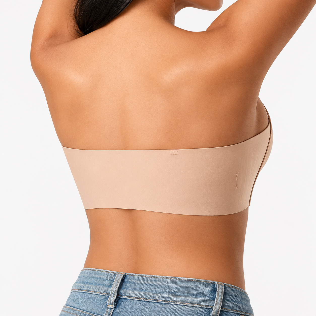 Back view of the strapless bra on model